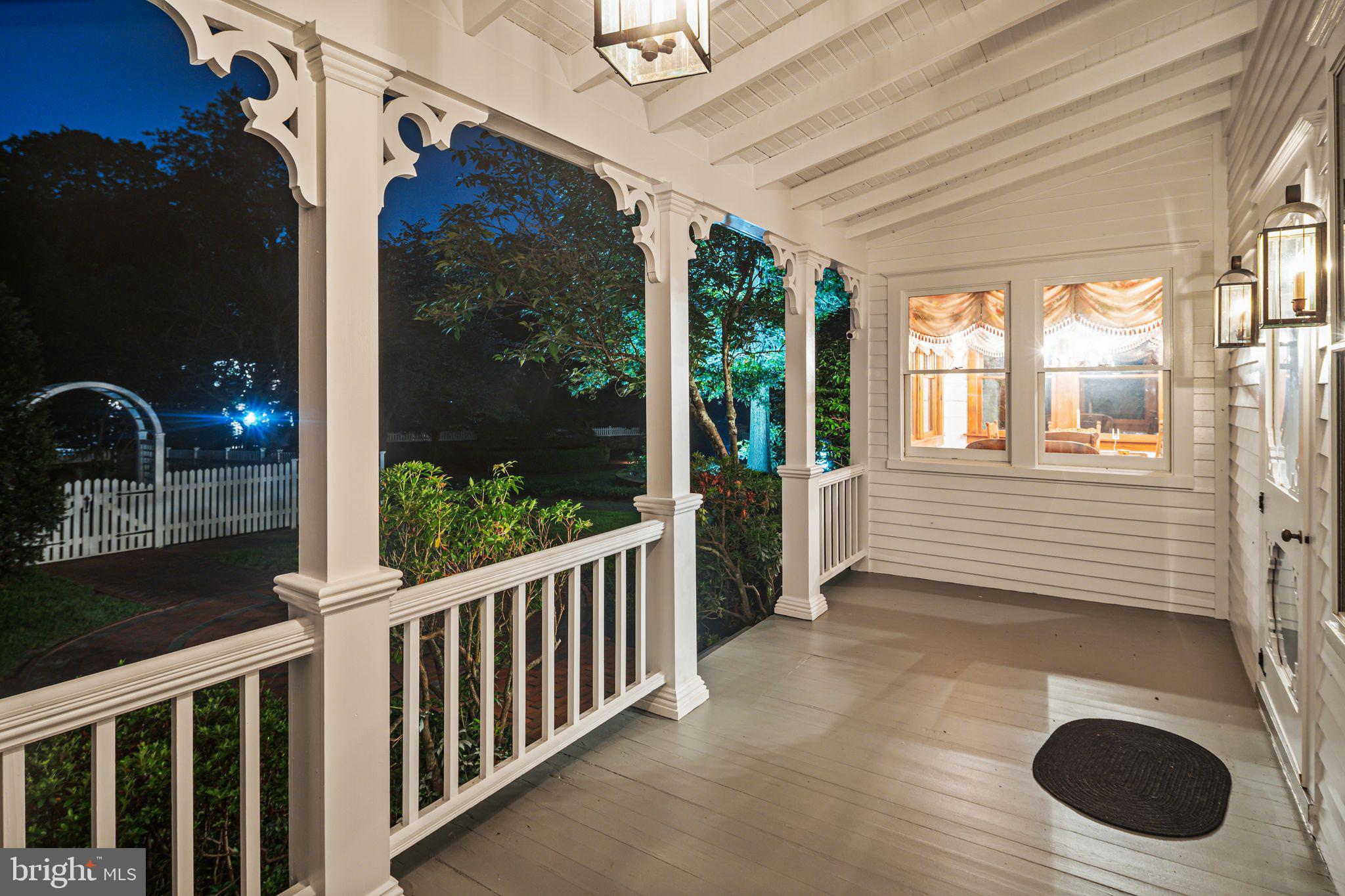 801 Cox Road Moorestown, NJ 08057 - Photo 98 of 110 a view of a porch with wooden floor and iron fence