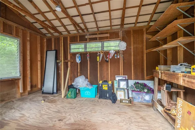 a view of a garage with a table and chairs