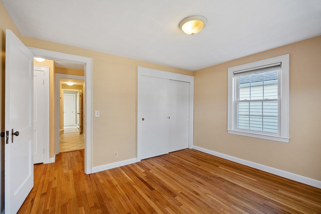 2 Craft Road Natick, MA 01760 - Photo 19 of 42 a view of empty room with wooden floor and fan
