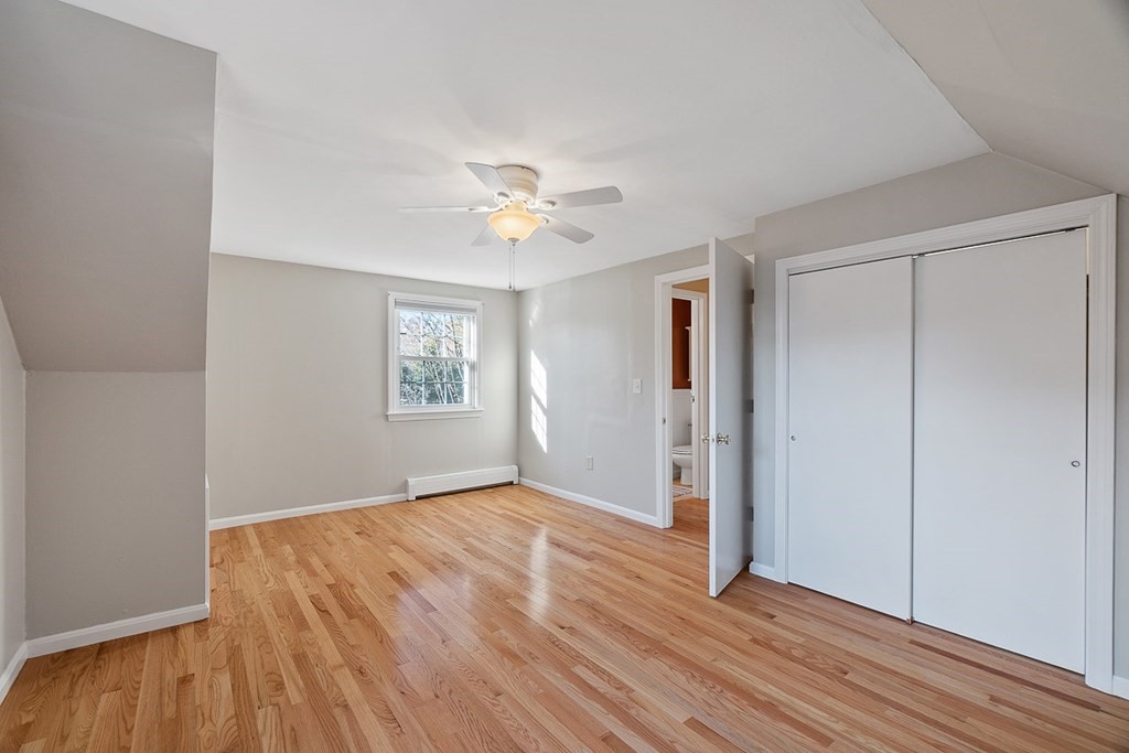 2 Craft Road Natick, MA 01760 - Photo 26 of 42 wooden floor in an empty room with a window