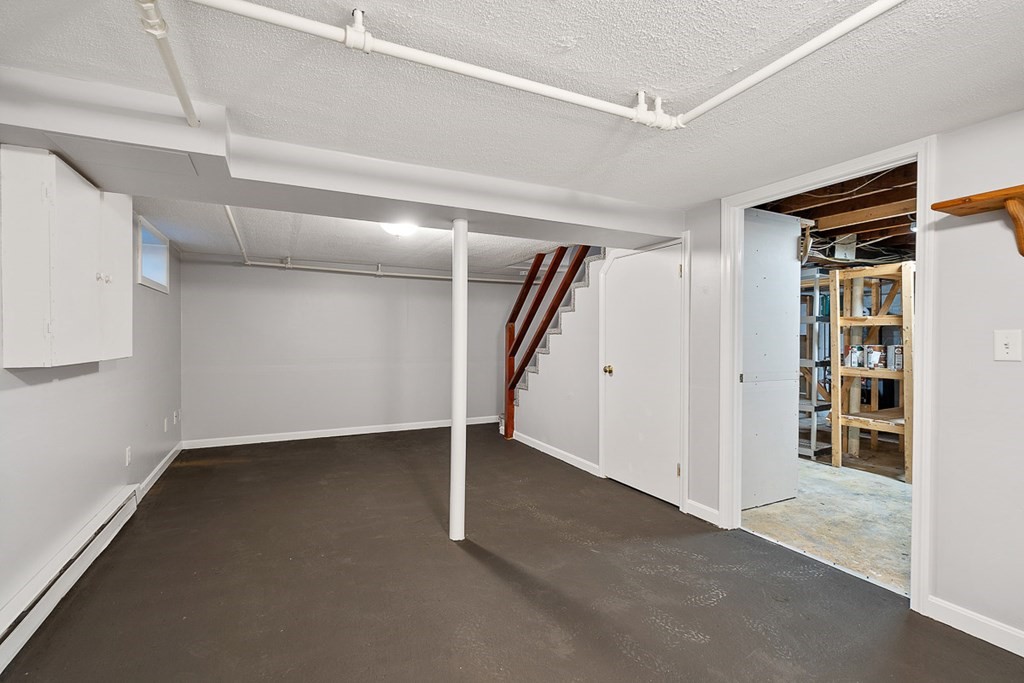 2 Craft Road Natick, MA 01760 - Photo 31 of 42 an empty room with shelves