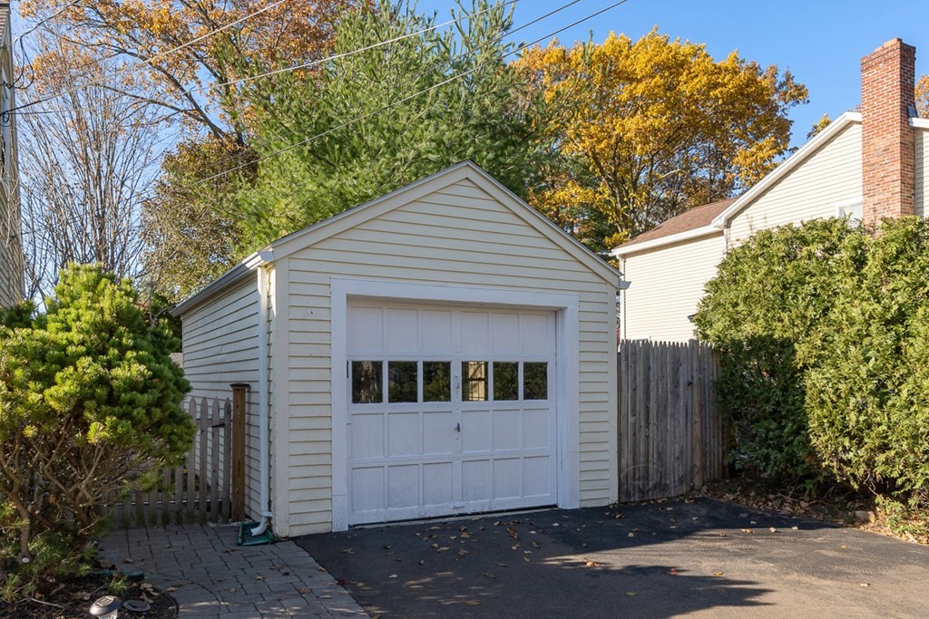 2 Craft Road Natick, MA 01760 - Photo 34 of 42 a front view of a house with a yard