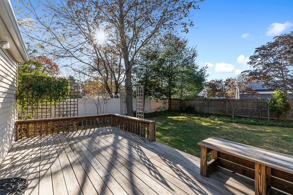 2 Craft Road Natick, MA 01760 - Photo 37 of 42 a view of a yard with wooden fence and trees