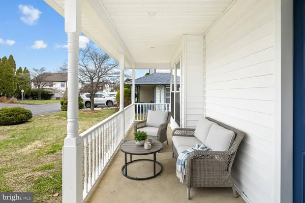 a view of balcony with furniture