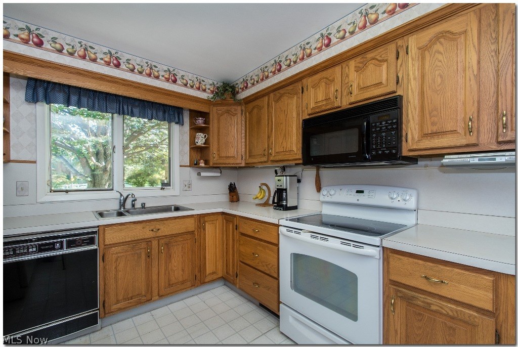 33600 Pinetree Road Cleveland, OH 44124 - Photo 10 of 23 Large Eat-in Kitchen with Breakfast Bar, Dinette Area with Bay Window and All
Appliances