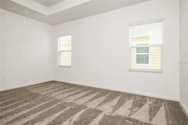 a view of a bedroom with a window