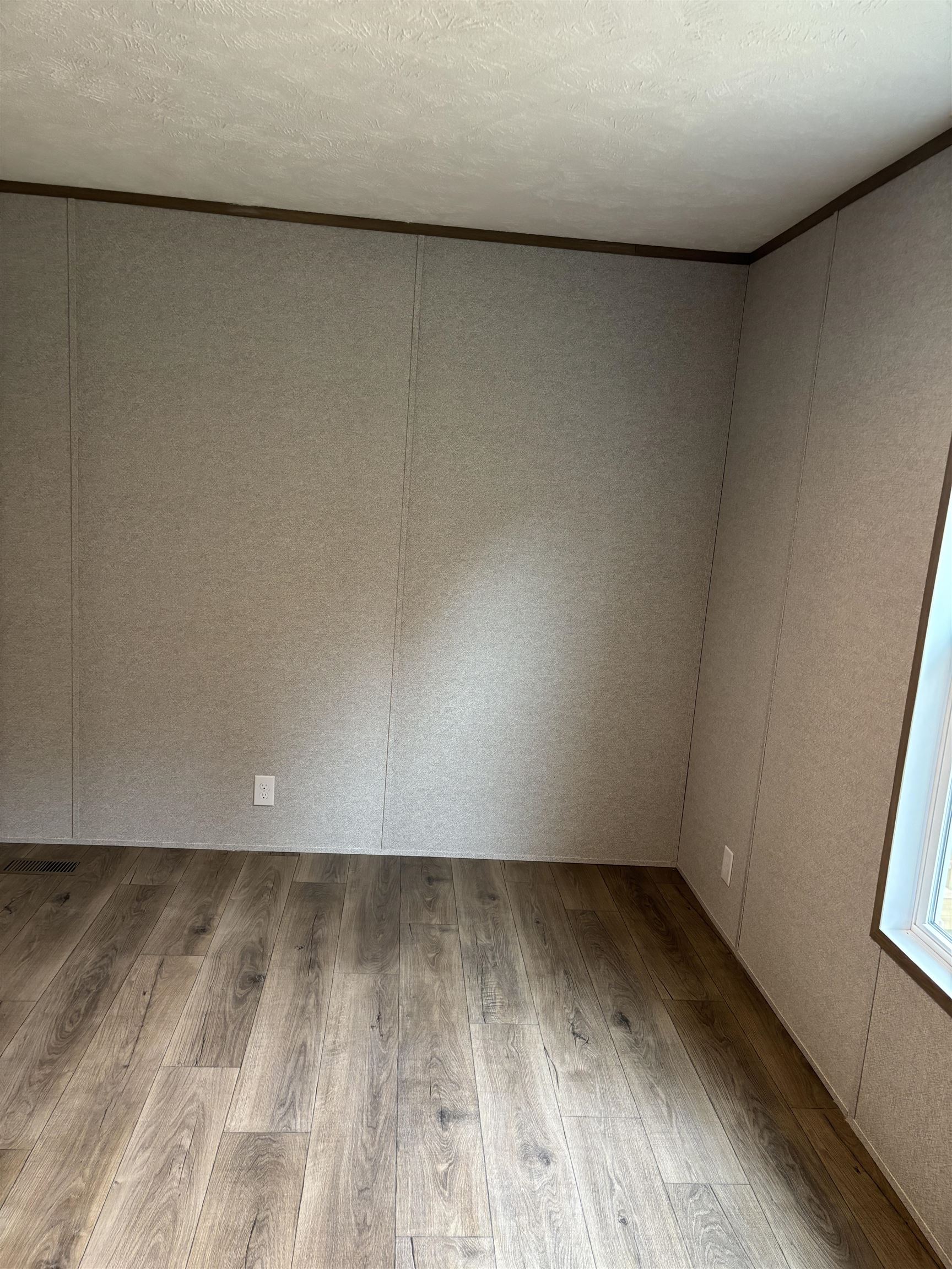 1131 Hobe Webb Road Ripley, TN 38063 - Photo 20 of 27 a view of room with window and wooden floor