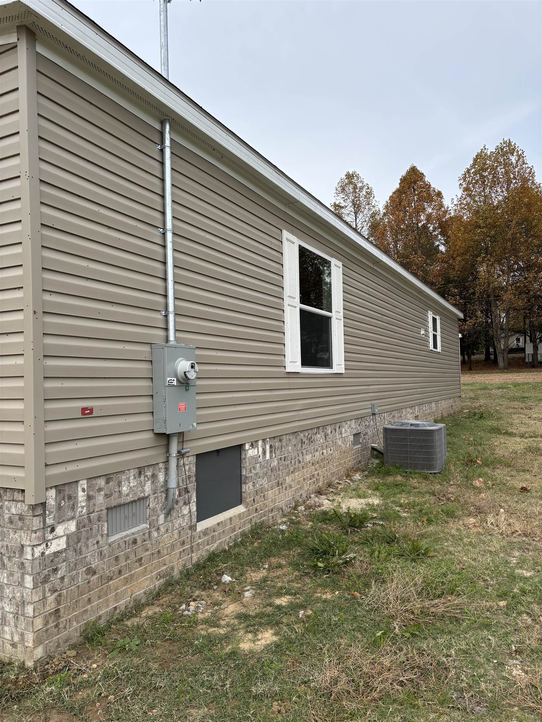 1131 Hobe Webb Road Ripley, TN 38063 - Photo 4 of 27 a backyard of a house