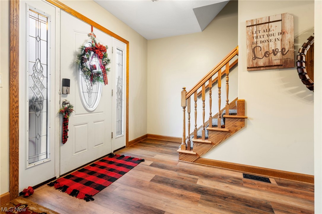 4915 Monticello Street Northwest Canton, OH 44708 - Photo 6 of 31 Entryway featuring light hardwood / wood-style floors