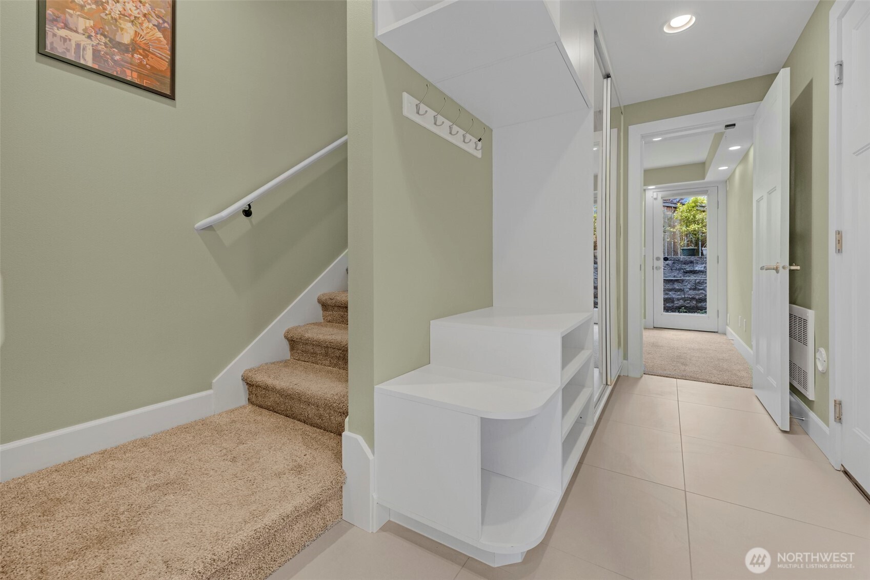 2118 West Ruffner Street Seattle, WA 98199 - Photo 21 of 37 a view of entryway and hall with wooden floor