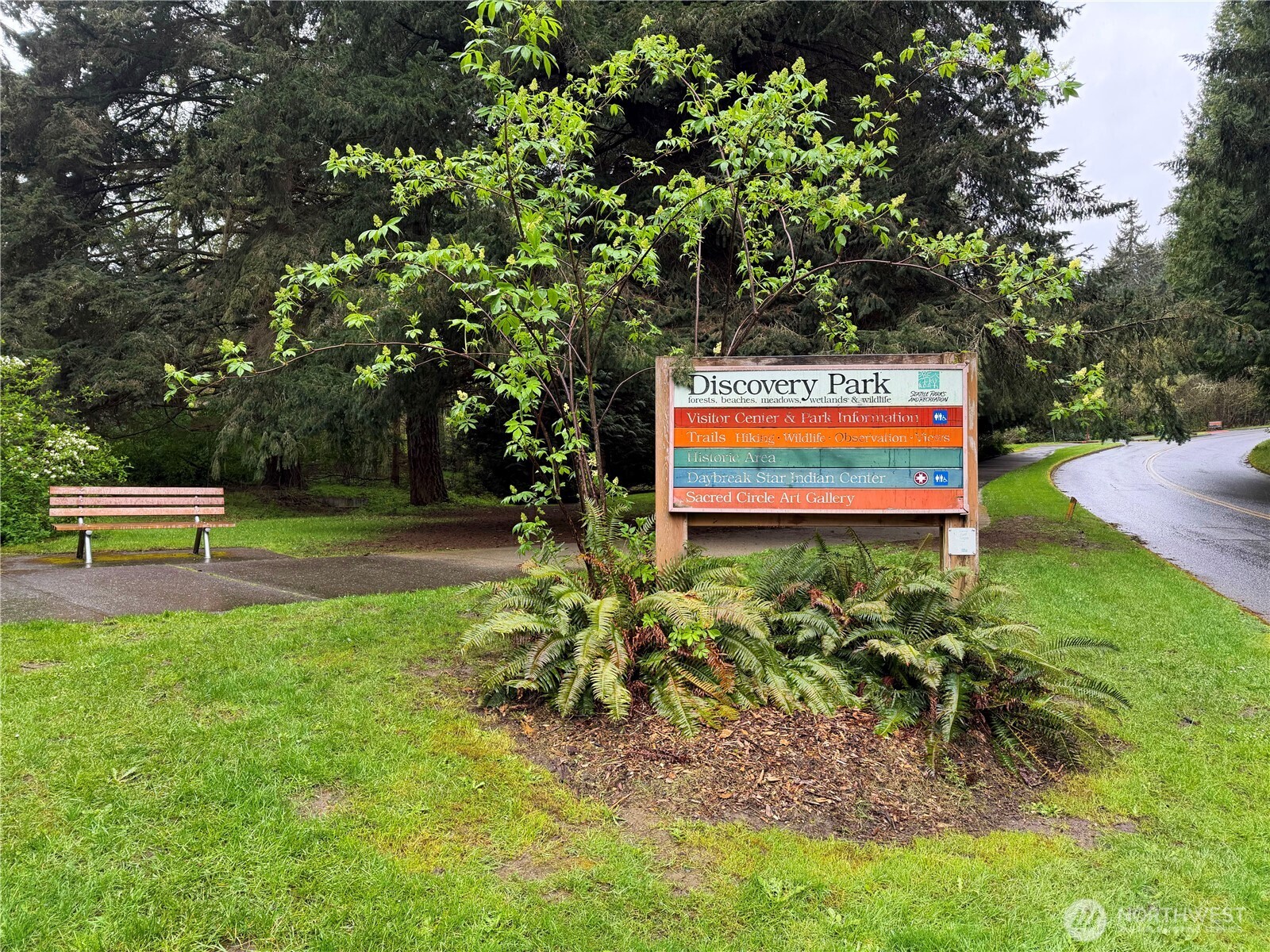 2118 West Ruffner Street Seattle, WA 98199 - Photo 34 of 37 a sign that is sitting in the grass