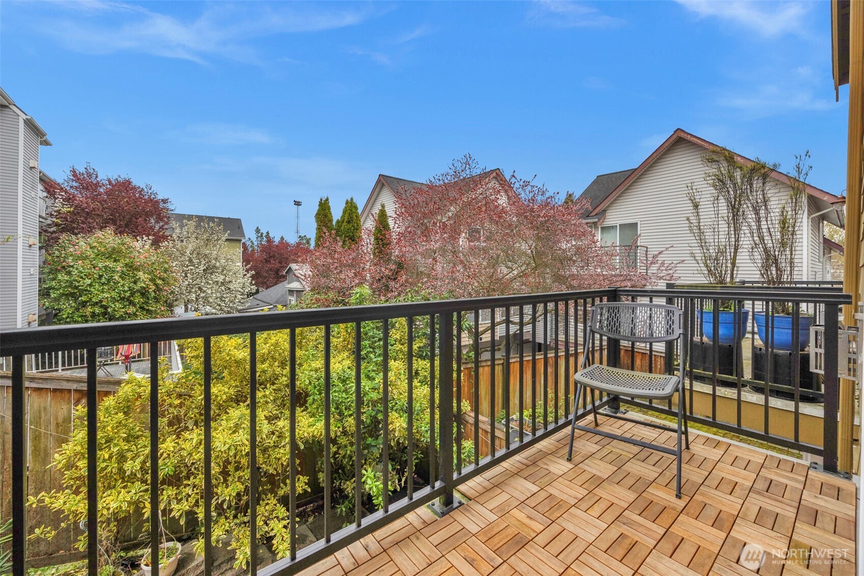 2118 West Ruffner Street Seattle, WA 98199 - Photo 4 of 37 a view of a balcony with wooden fence