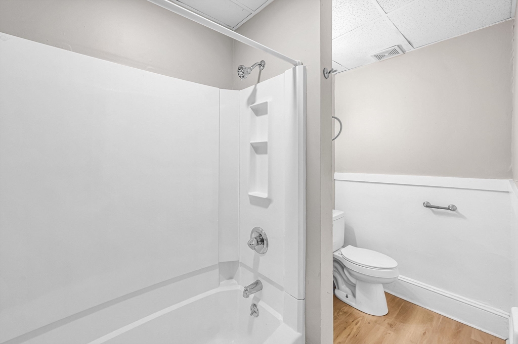 92 Woodside Terrace, Unit 3R Springfield, MA 01108 - Photo 29 of 42 a bathroom with a shower and a toilet