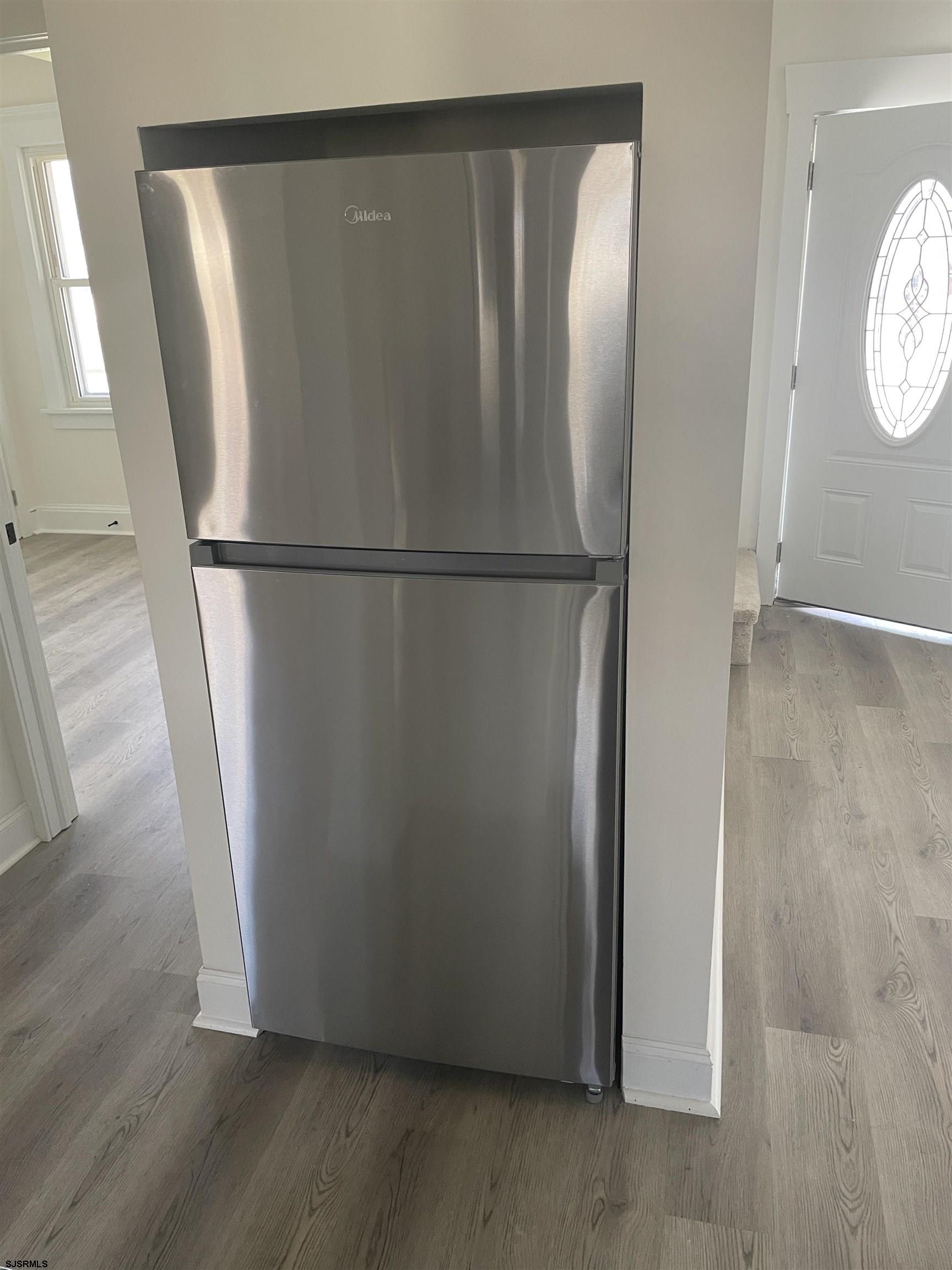 509 Buffalo Avenue Egg Harbor City, NJ 08215 - Photo 13 of 14 a view of a room with wooden floor