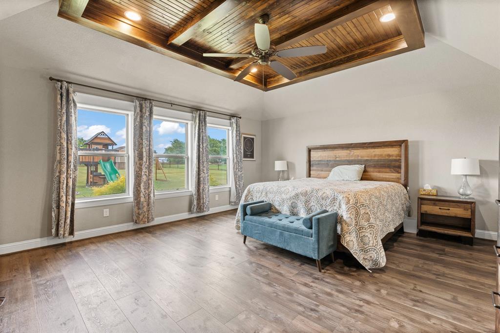 9708 Puma Trail Godley, TX 76044 - Photo 13 of 40 a bedroom with a bed and a large window