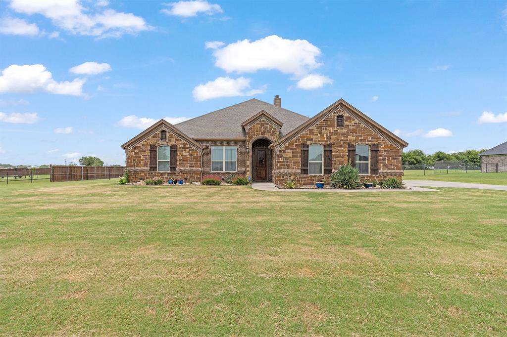 9708 Puma Trail Godley, TX 76044 - Photo 39 of 40 a front view of a house with a big yard