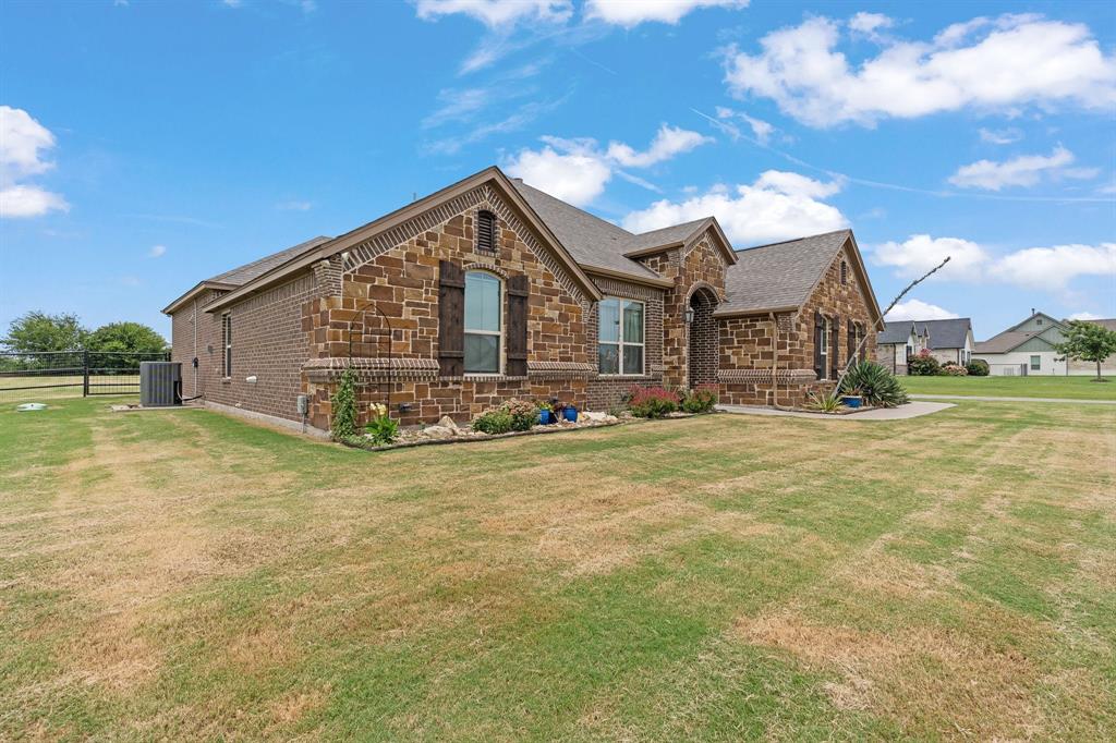 9708 Puma Trail Godley, TX 76044 - Photo 40 of 40 a view of a house with a yard