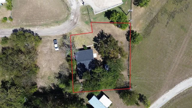 a view of a swimming pool with an outdoor space and seating area