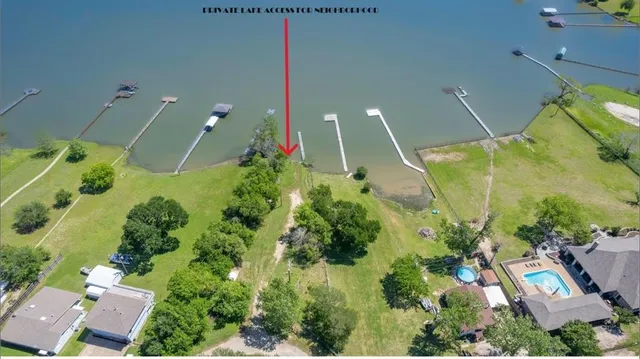 a large kitchen with stainless steel appliances granite countertop a stove and a refrigerator