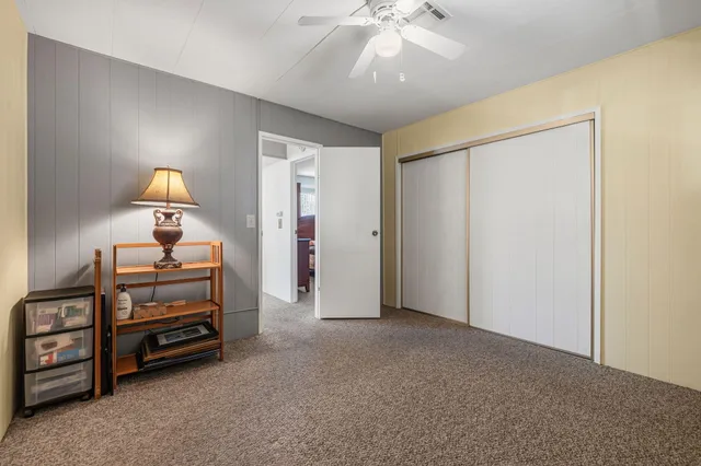 a view of a livingroom with furniture