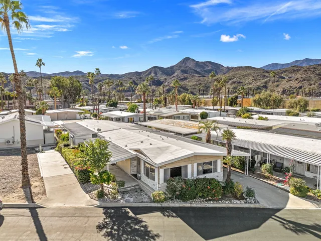 a view of a city with an ocean view