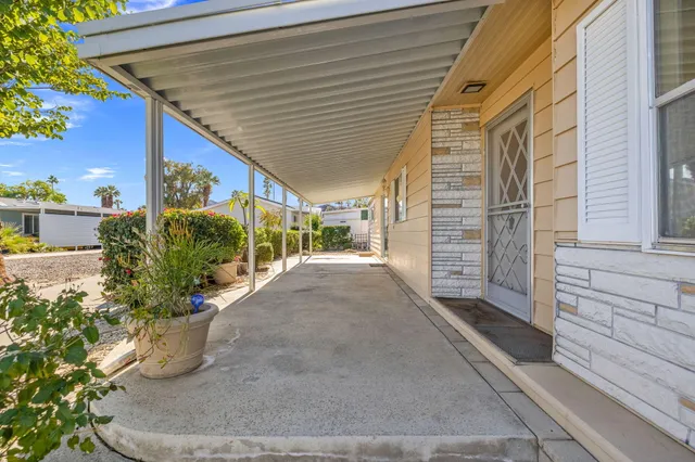 a porch with seating space
