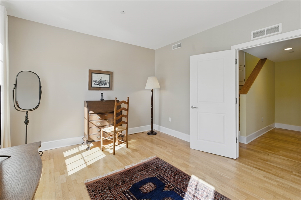 2 Powder Mill Square, Unit 2B Andover, MA 01810 - Photo 15 of 31 a living room with furniture and a window