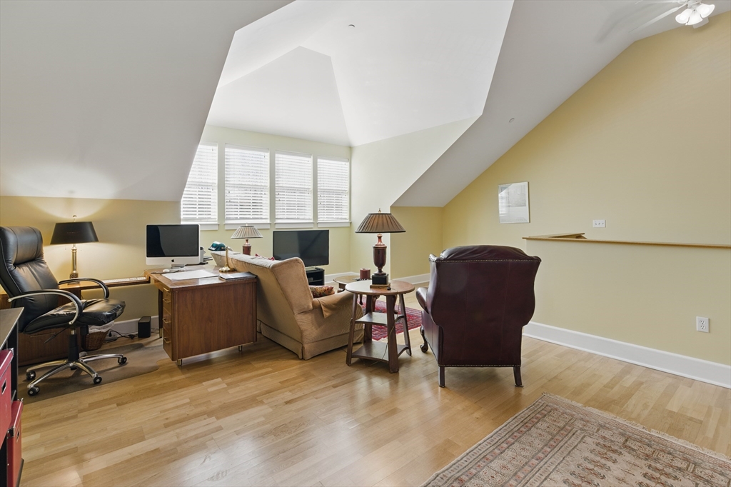 2 Powder Mill Square, Unit 2B Andover, MA 01810 - Photo 22 of 31 a living room with furniture and a large window