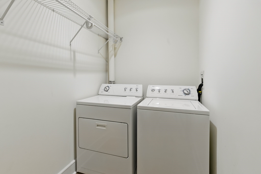 2 Powder Mill Square, Unit 2B Andover, MA 01810 - Photo 25 of 31 a utility room with dryer and washer