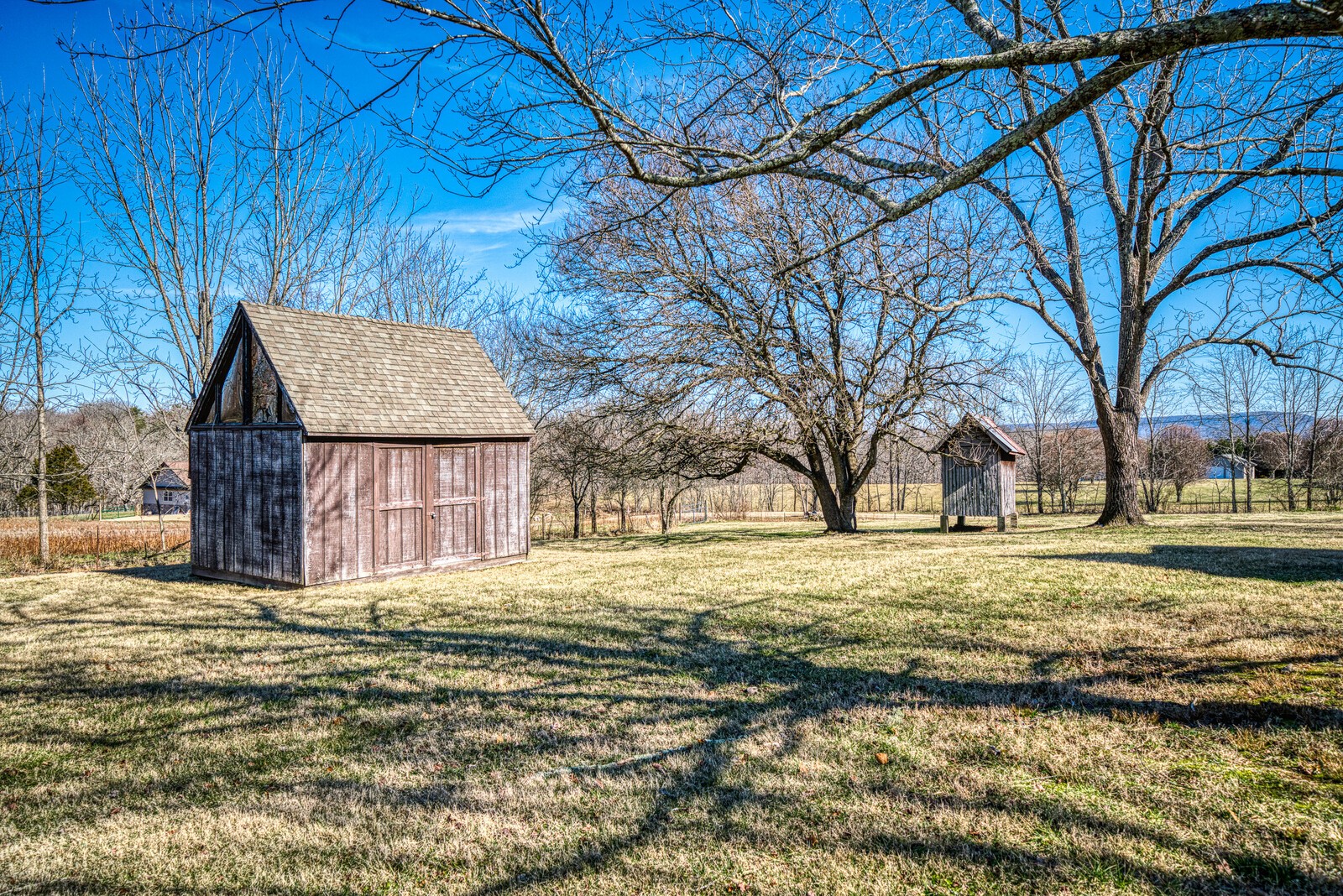 1495 Deep Draw Road Crossville, TN 38555 - Photo 33 of 41 a wooden bench sitting in the middle of a yard