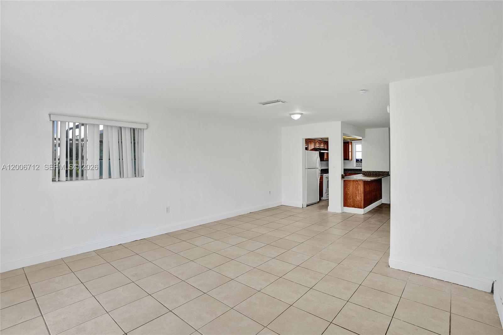 7344 Southwest 82nd Street, Unit C114 Miami, FL 33143 - Photo 11 of 30 a view of kitchen and window