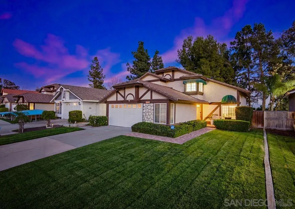 39900 Quigley Road Murrieta, CA 92562 - Photo 1 of 58 a front view of a house with a yard table and chairs