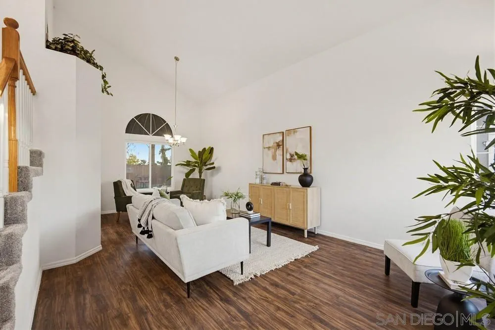 39900 Quigley Road Murrieta, CA 92562 - Photo 25 of 58 a living room with furniture and a wooden floor