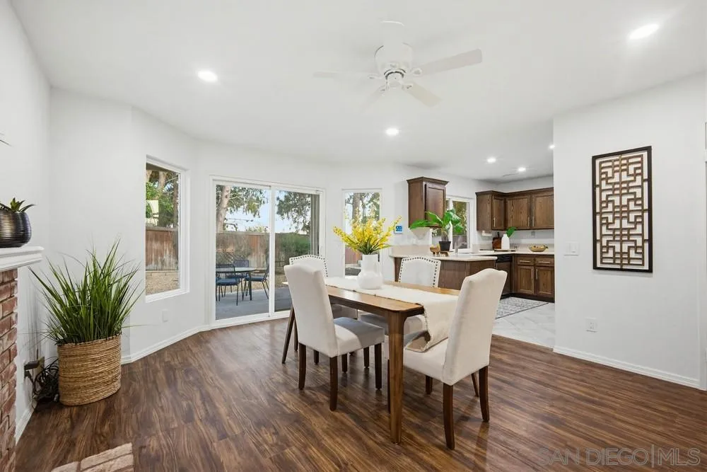 39900 Quigley Road Murrieta, CA 92562 - Photo 29 of 58 a view of a dining room with furniture window and wooden floor