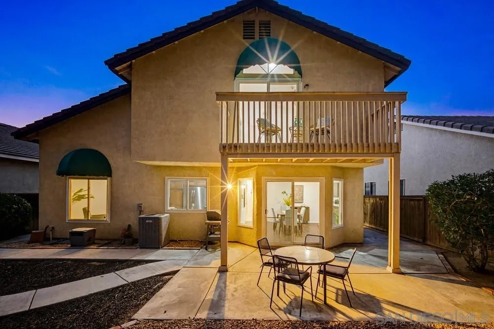 39900 Quigley Road Murrieta, CA 92562 - Photo 31 of 58 a front view of a house with a yard