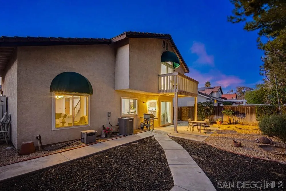 39900 Quigley Road Murrieta, CA 92562 - Photo 33 of 58 a front view of a house with a yard