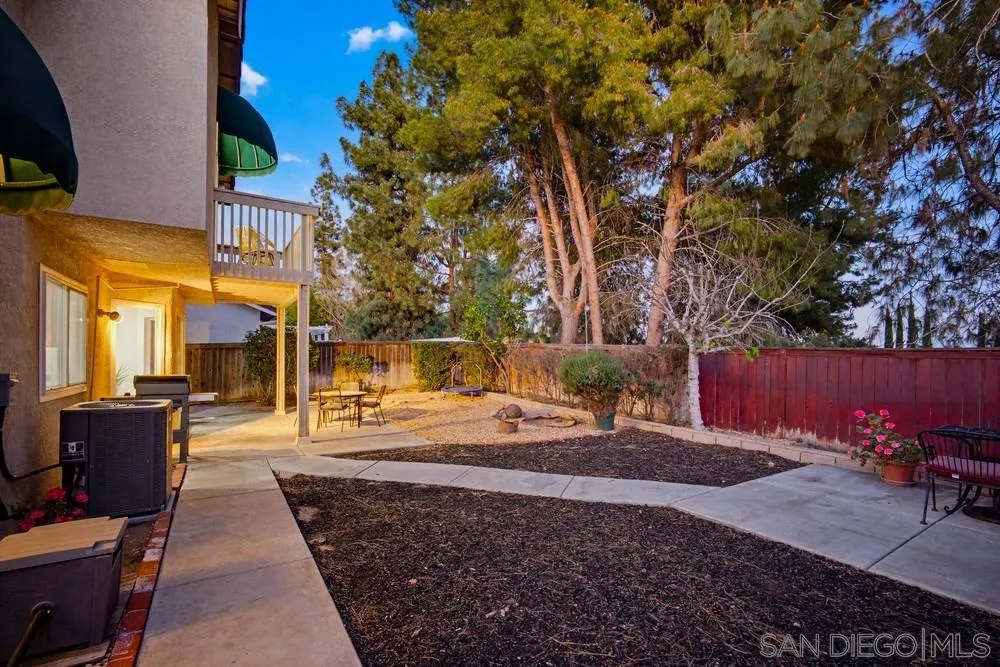 39900 Quigley Road Murrieta, CA 92562 - Photo 34 of 58 a view of a patio with chairs and potted plants