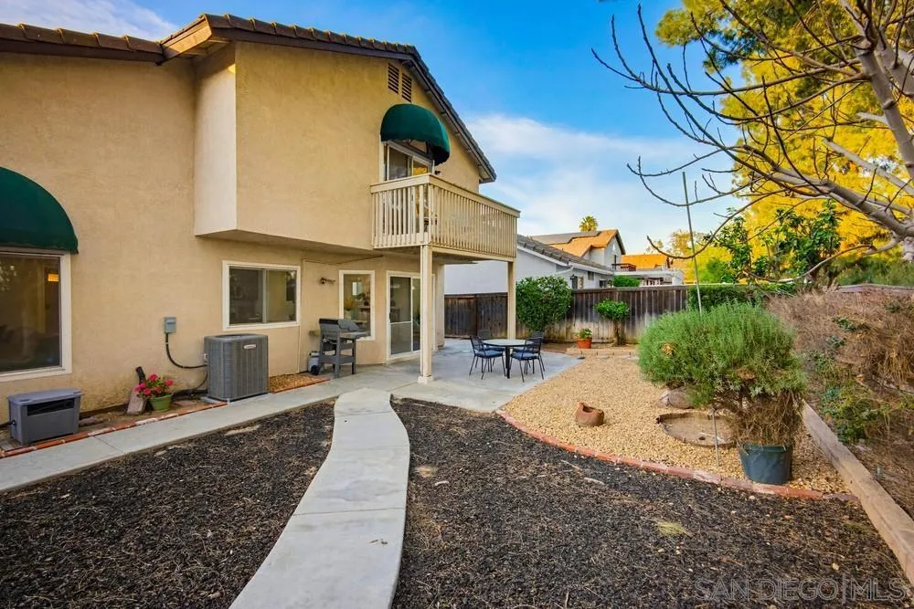 39900 Quigley Road Murrieta, CA 92562 - Photo 38 of 58 a view of a house with backyard and sitting area