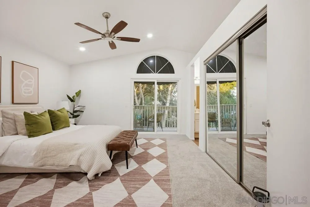 39900 Quigley Road Murrieta, CA 92562 - Photo 44 of 58 a bedroom with a bed and a large window