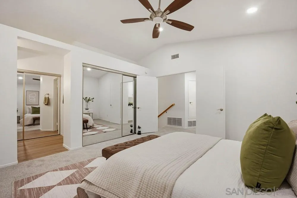 39900 Quigley Road Murrieta, CA 92562 - Photo 45 of 58 a bedroom with a bed and a mirror