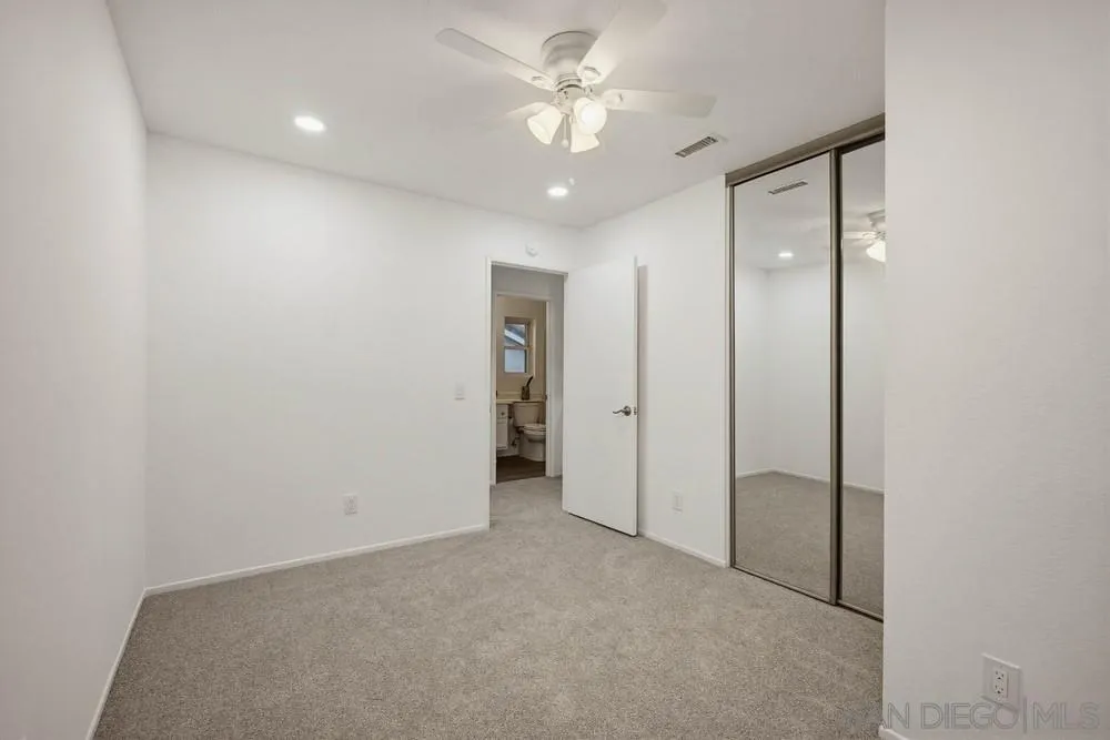 39900 Quigley Road Murrieta, CA 92562 - Photo 52 of 58 an empty room with fan and entrance