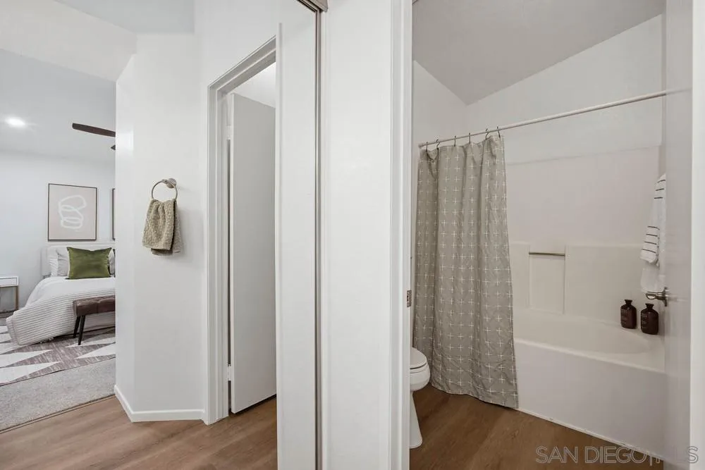 39900 Quigley Road Murrieta, CA 92562 - Photo 56 of 58 a bathroom with a bathtub and a shower