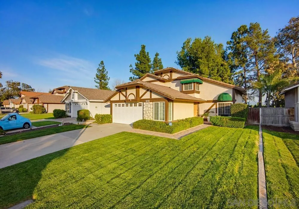 39900 Quigley Road Murrieta, CA 92562 - Photo 6 of 58 a view of a house with swimming pool