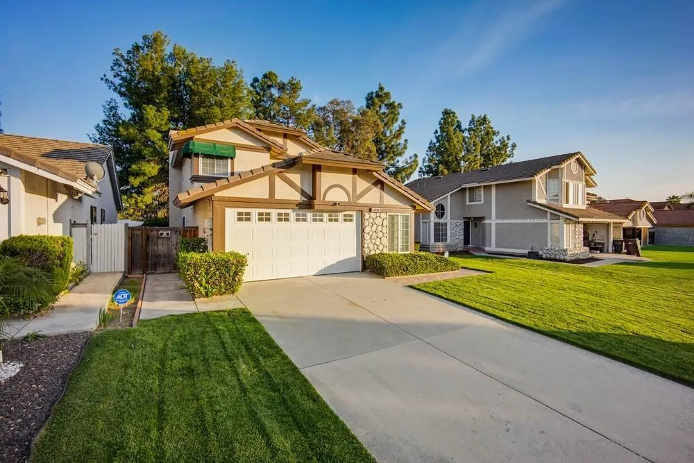 39900 Quigley Road Murrieta, CA 92562 - Photo 7 of 58 a house with garden in front of it