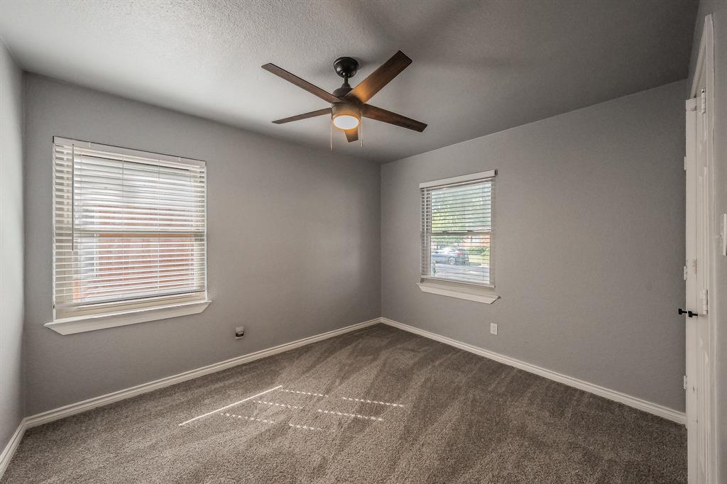 10866 Cassandra Way Dallas, TX 75228 - Photo 12 of 22 a view of an empty room with a window