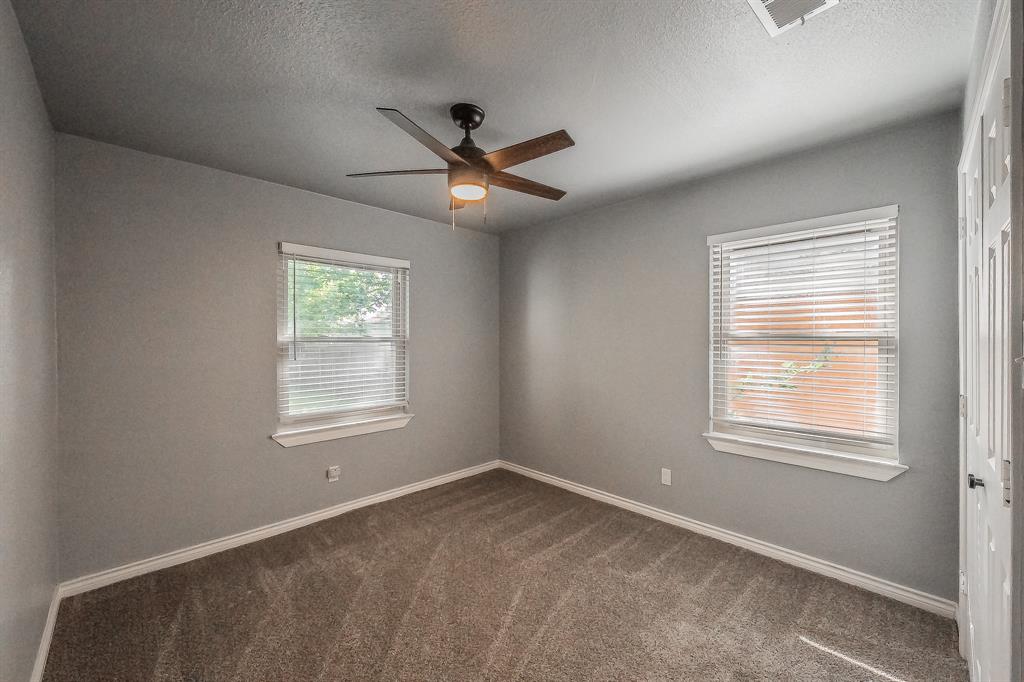10866 Cassandra Way Dallas, TX 75228 - Photo 15 of 22 a view of an empty room with a window