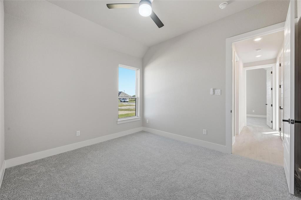 108 Rocky Top Azle, TX 76020 - Photo 32 of 40 an empty room with a empty space and a window