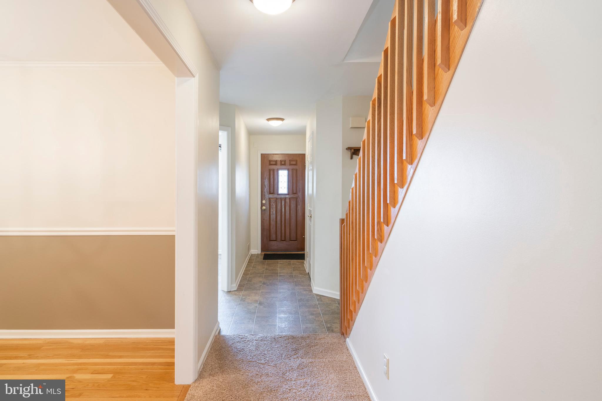 8 Foster Lane, Unit R8 Downingtown, PA 19335 - Photo 12 of 56 View from the Great room to the front door.