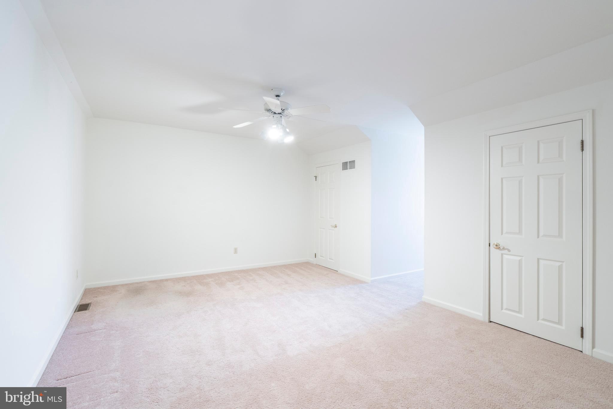 8 Foster Lane, Unit R8 Downingtown, PA 19335 - Photo 38 of 56 3rd bedroom loft with ceiling fan and storage!