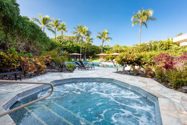 a view of a garden with a patio
